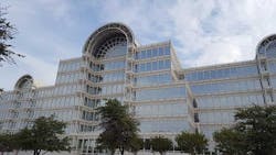 The glass facade of the Dallas Infomart, the leading carrier hotel and connectivity hub in Dallas, which was acquired by Equinix in 2018. (Photo: Rich Miller)