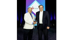 Bob Cassiliano (L), Chairman and CEO of 7x24 Exchange International, presented Dennis D. Cronin (R) with the 7x24 Exchange International Lifetime of Service Award.