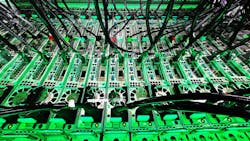 Servers immersed in liquid coolant in an immersion cooling research lab at Intel.